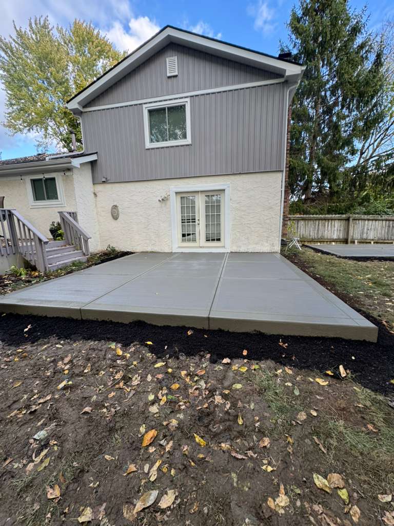 Back patio concrete installation