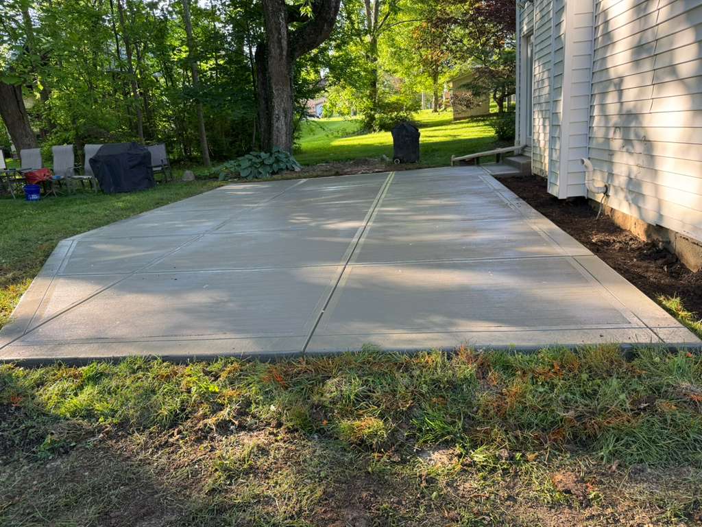 Back patio concrete installation