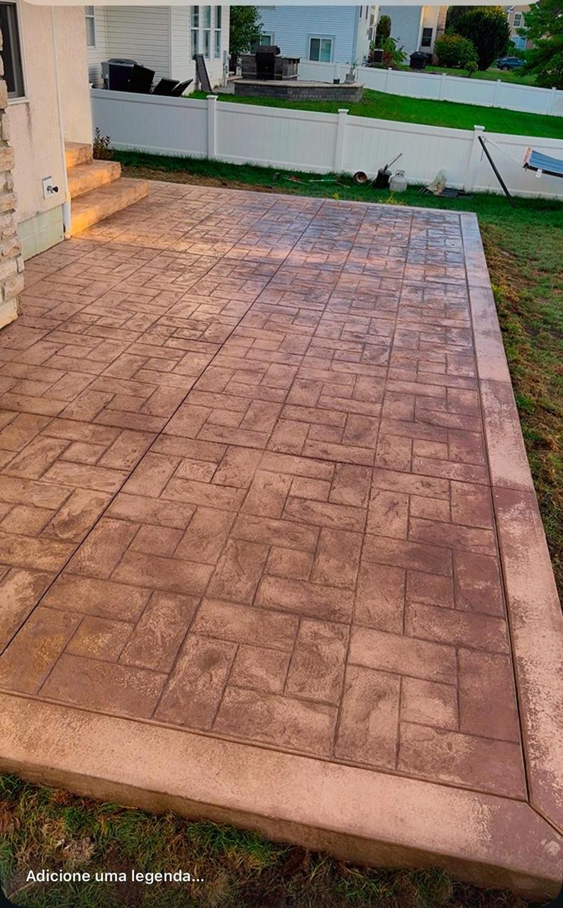 Terracotta herringbone stamped concrete patio